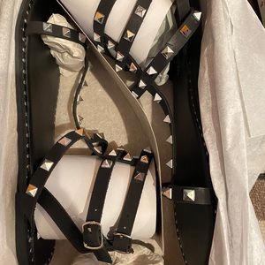 Studded black sandals